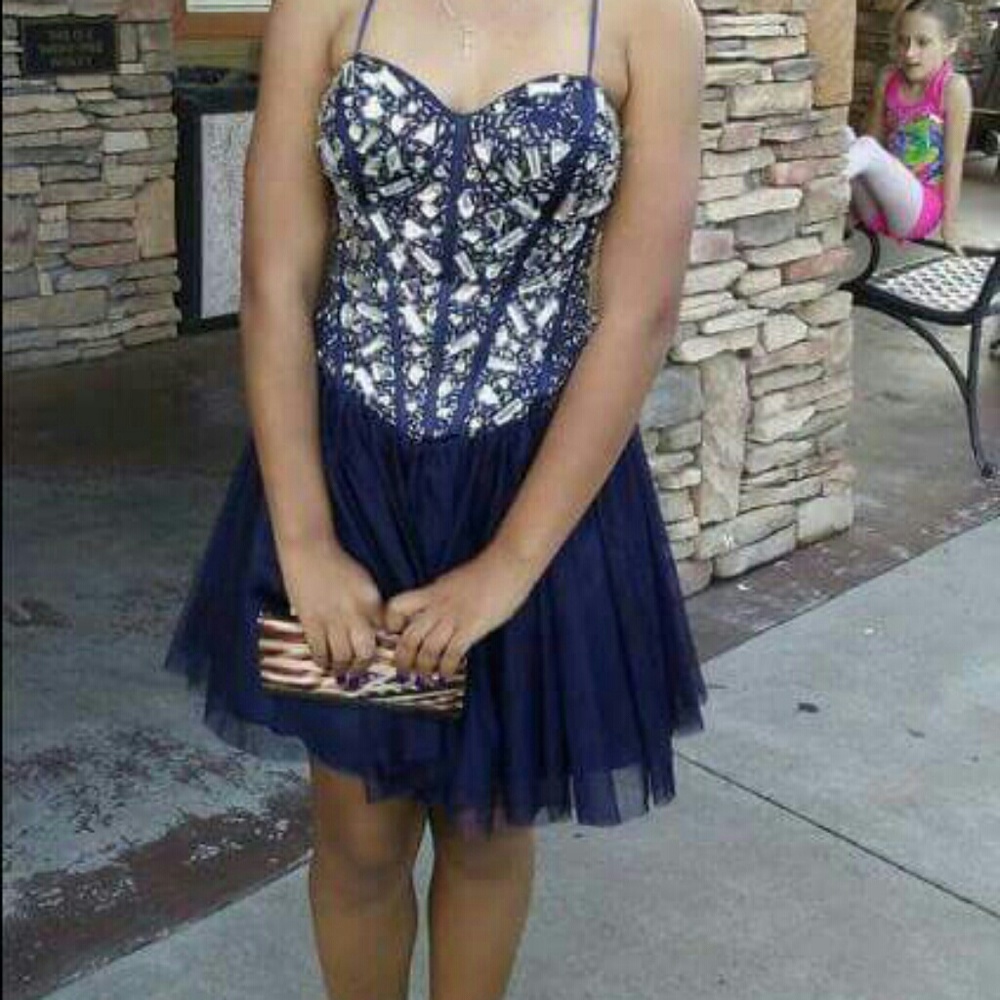 Blue jeweled prom dress